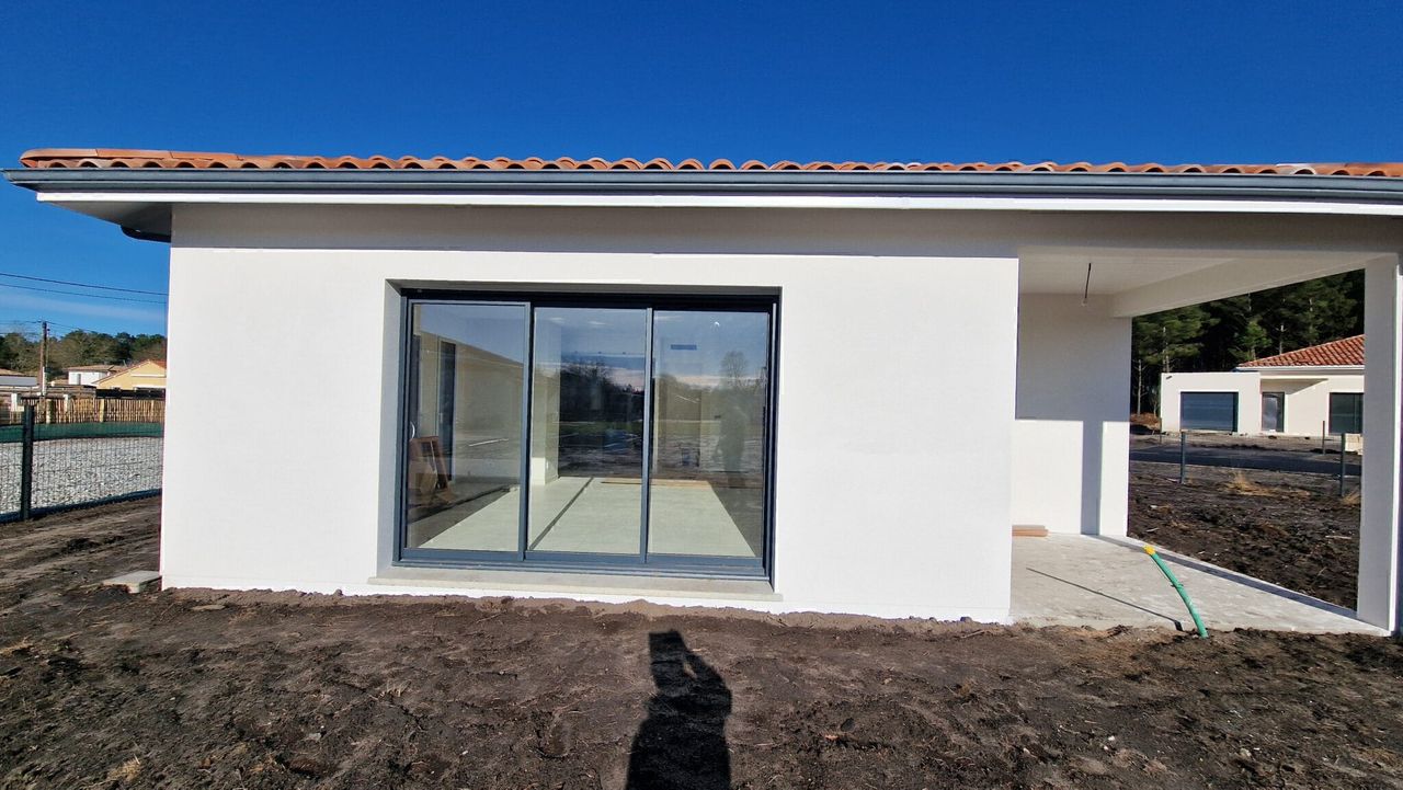 Baie vitrée 3 vantaux maison Téthieu Grand Dax